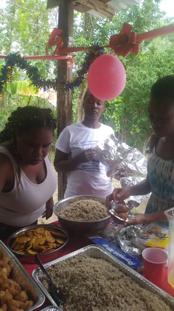 Community gathering at food distribution